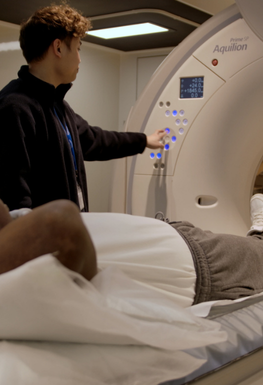 Person going into a lung cancer screening machine