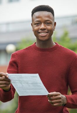 A student, male, looking at his exam results