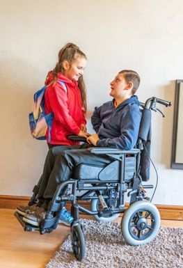 An image of a young carer with their parent