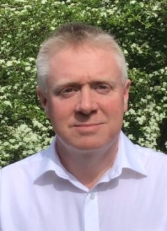 A photograph of Dr Huw Thomas
