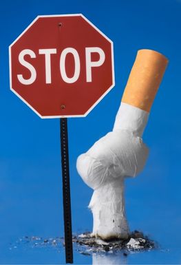 Stop sign with a knotted cigarette